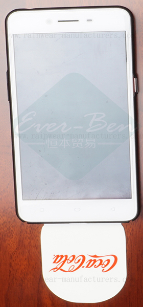 Reusable phone paste sticker holder on wooden